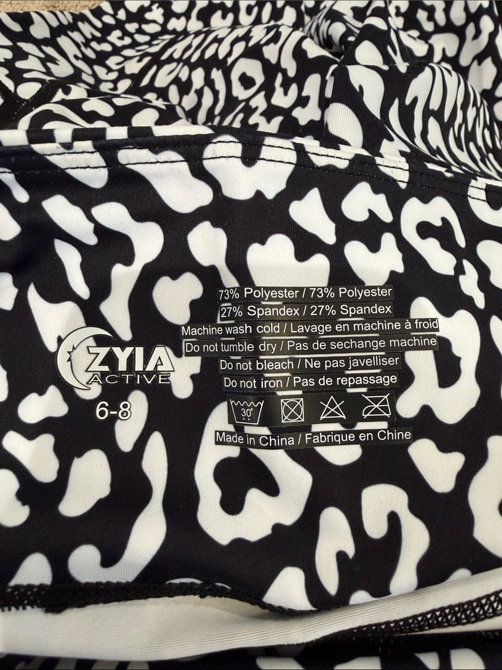 ZYIA Three-Pack Leggings in Black, Blue & Black/White Print - Picture 2 of 4